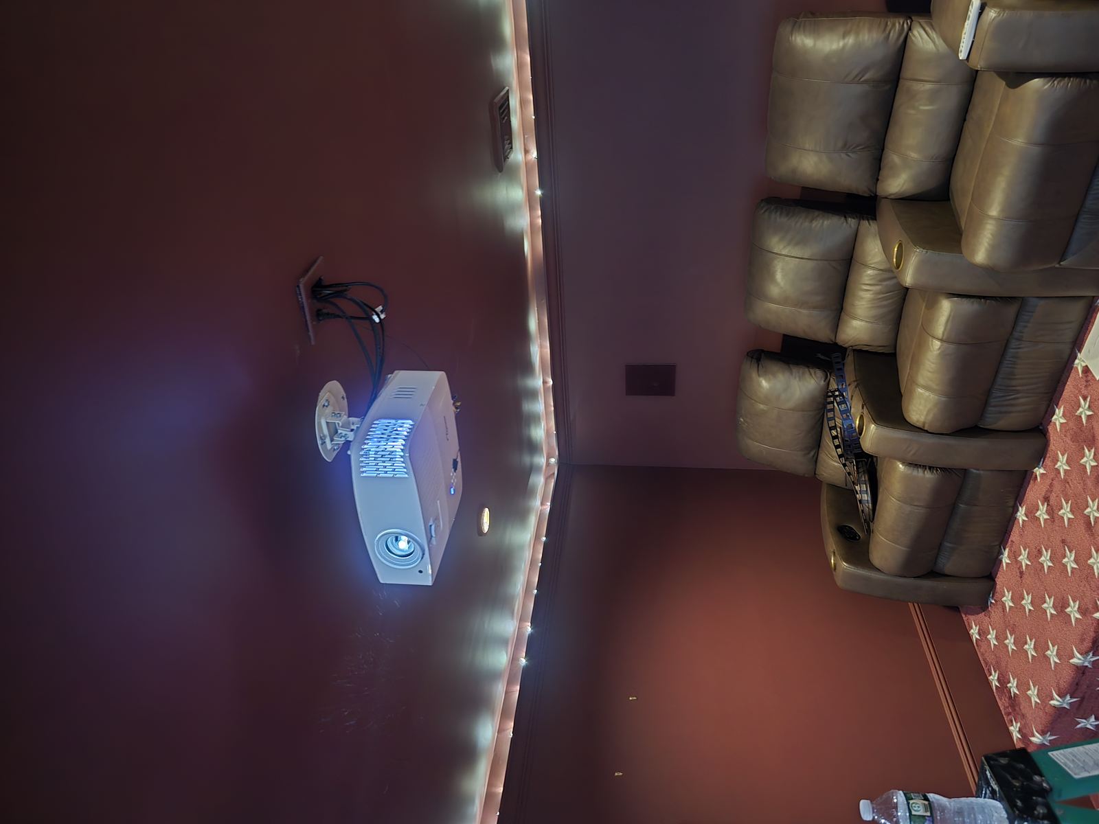Home theater seating with ceiling projector