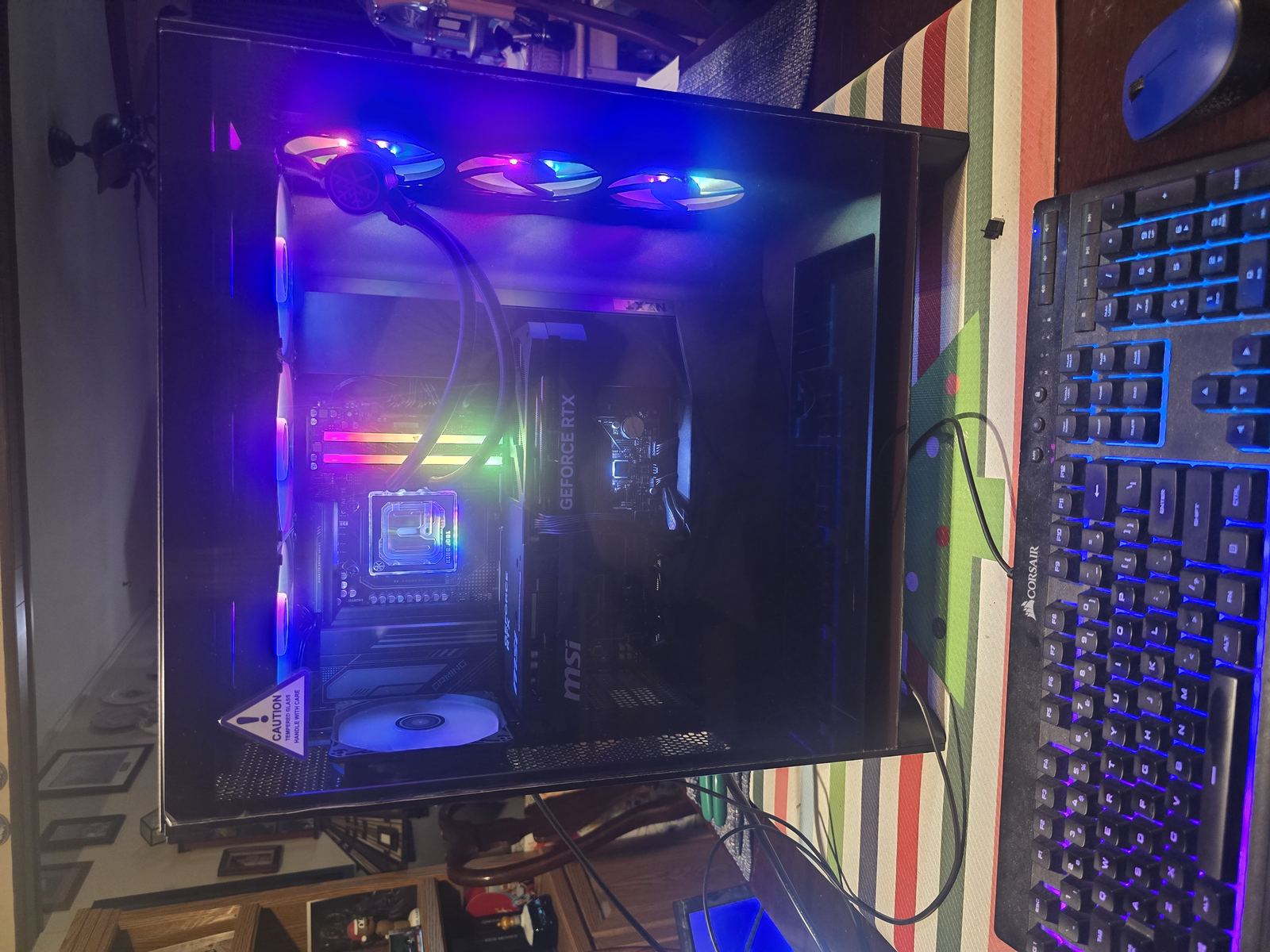 Custom PC build with liquid cooling fans installed