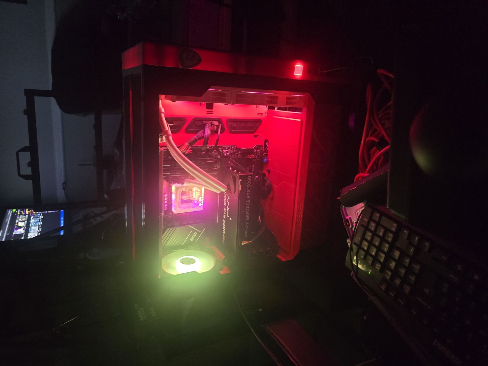 Custom gaming PC build lit up in the dark