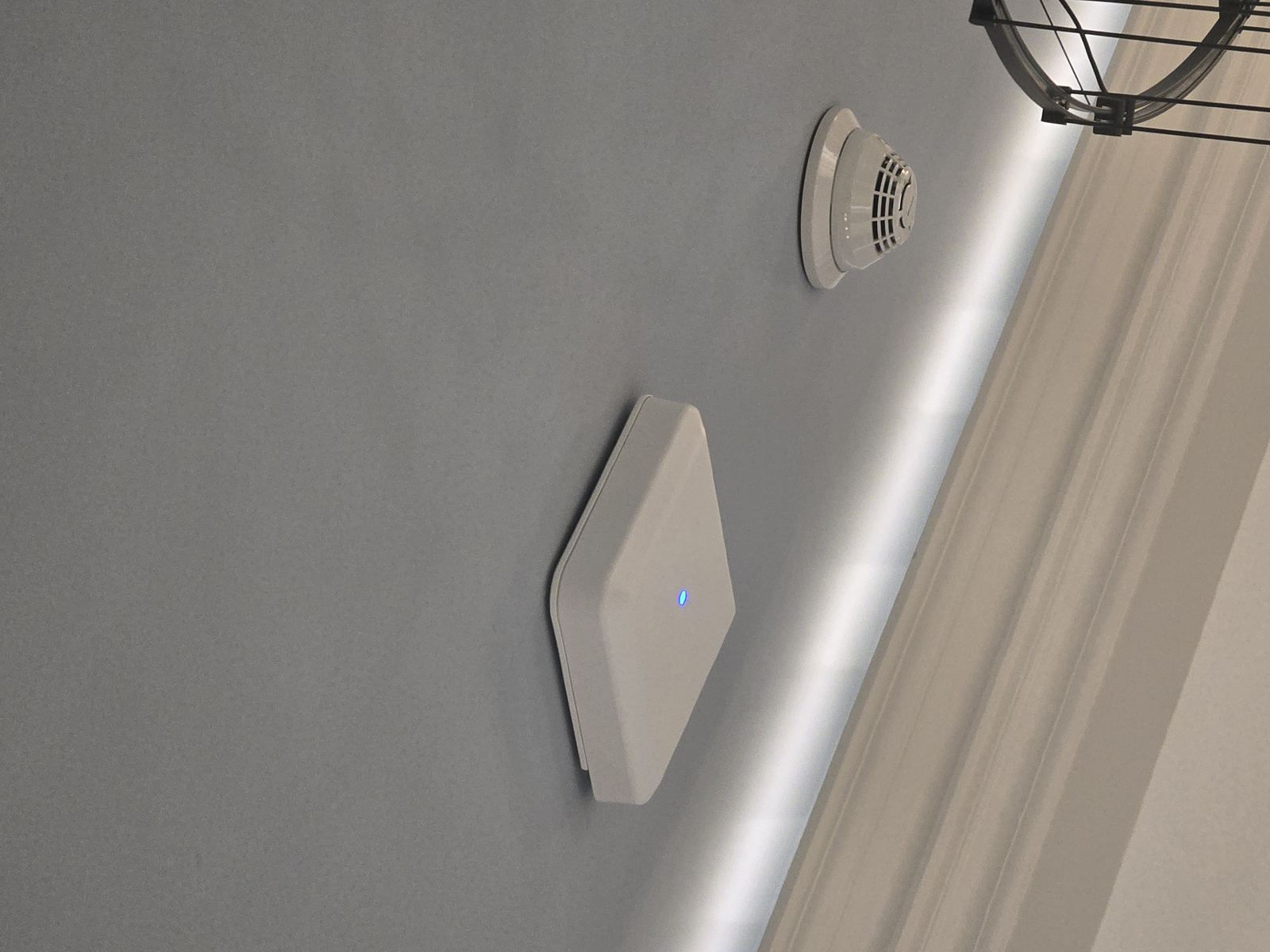 Wireless access point mounted in vaulted ceiling corner